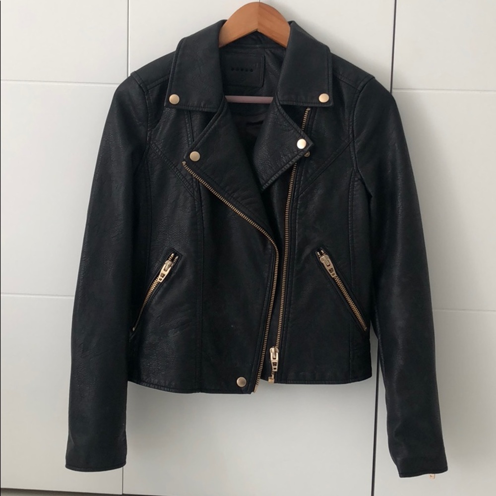 Black leather jacket with gold hardware
